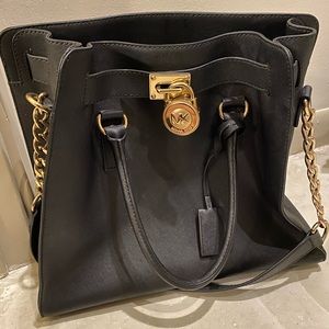 Black and gold Michael Kors Purse